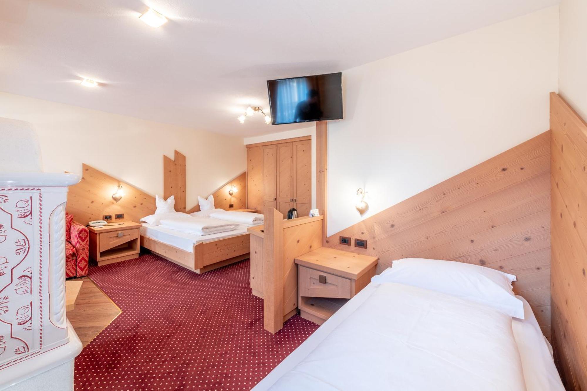 Rene Dolomites Boutique Hotel Поцца-ди-Фасса Номер фото