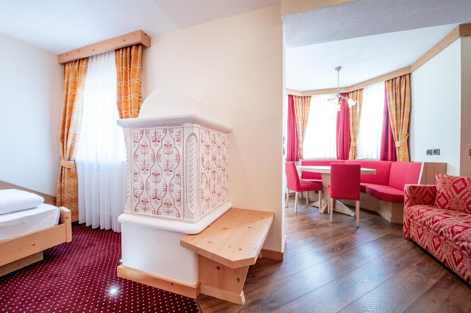 Rene Dolomites Boutique Hotel Поцца-ди-Фасса Номер фото