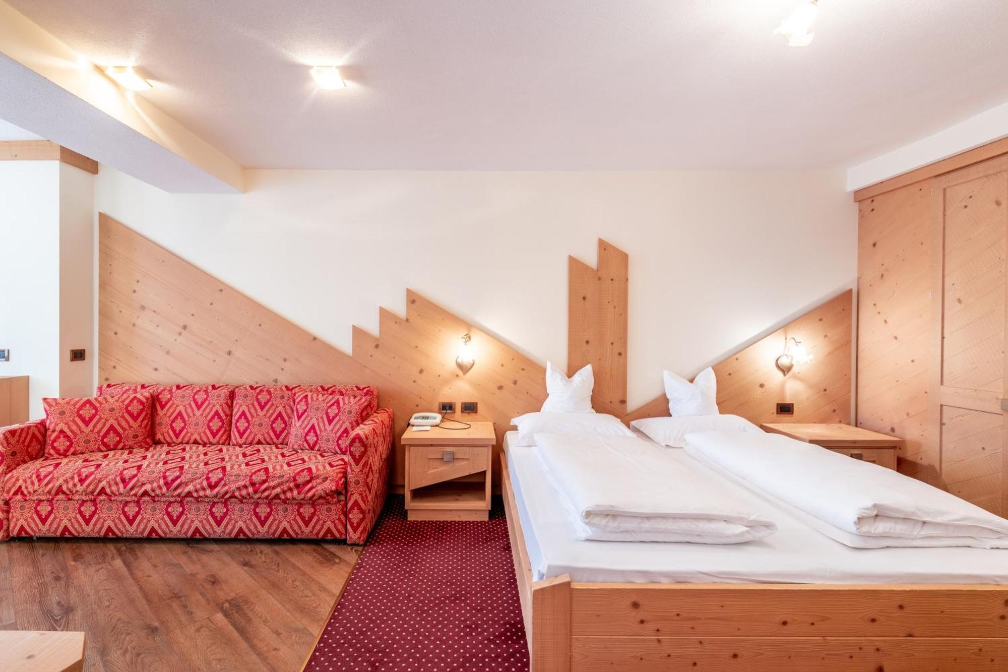 Rene Dolomites Boutique Hotel Поцца-ди-Фасса Номер фото